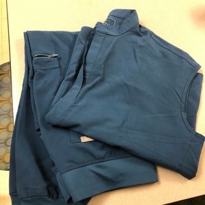 Size large petite figs jogger scrub pants and size large scrub top to match.